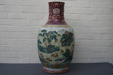 A Chinese famille rose vase with deers in a landscape, Qianlong mark, 19/20th C.