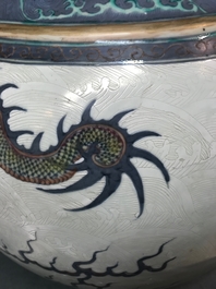 A pair of large Chinese doucai 'dragon' bottle vases, tianqiu ping, Qianlong mark, 19th C.