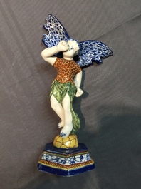 A polychrome Dutch Delft allegorical model of the angel 'Fame', 18th C.