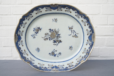 A Chinese blue, white and gilt part service, Qianlong