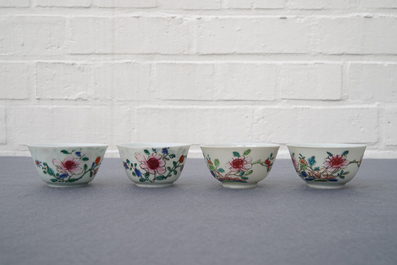 A Chinese famille rose teapot, nine cups and six saucers, Qianlong