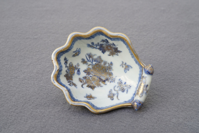 A Chinese blue, white and gilt part service, Qianlong