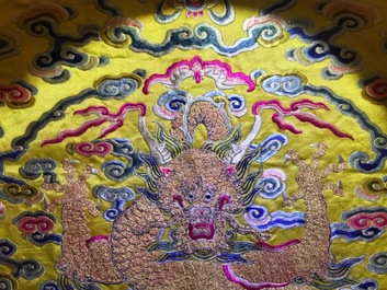 An imperial Chinese embroidered silk gold-thread yellow ground cushion cover, 19th C.