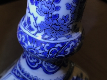 A Dutch Delft blue and white facetted bottle vase, last quarter 17th C.