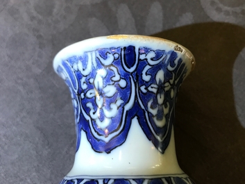 A Dutch Delft blue and white facetted bottle vase, last quarter 17th C.