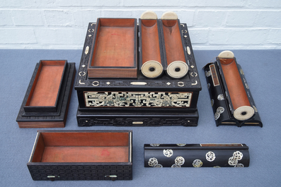 A Chinese bone and mother of pearl inlaid wood box with multiple compartments, 19th C.