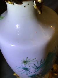 Une paire de vases en porcelaine de Chine famille rose mont&eacute;s comme candelabres, Yongzheng