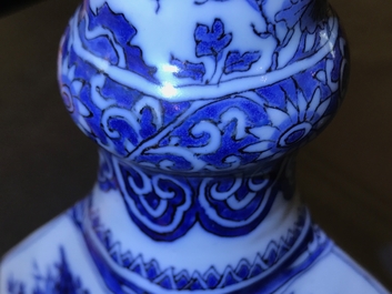 A Dutch Delft blue and white facetted bottle vase, last quarter 17th C.