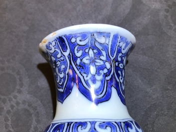 A Dutch Delft blue and white facetted bottle vase, last quarter 17th C.