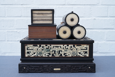 A Chinese bone and mother of pearl inlaid wood box with multiple compartments, 19th C.