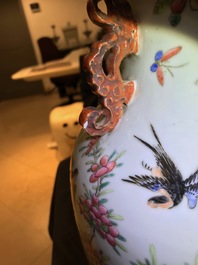A Chinese famille rose 'phoenixes and pheasants' vase, 19th C.