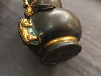 A Chinese parcel-gilt bronze double gourd hanging censer and cover, Kangxi mark, Qing