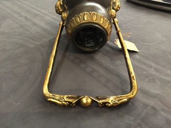 A Chinese parcel-gilt bronze double gourd hanging censer and cover, Kangxi mark, Qing