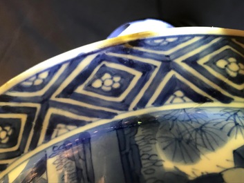 A Chinese blue and white klapmuts bowl with figural design, Kangxi mark and period