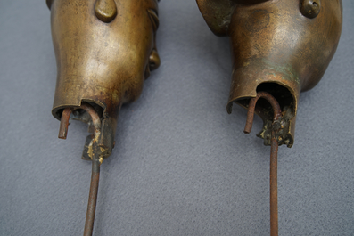 A pair of large Chinese bronze nodding-head figures for the Vietnamese market, 19th C.