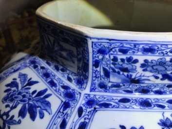 A pair of large Chinese blue and white octagonal baluster vases and covers, Kangxi