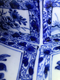 A pair of large Chinese blue and white octagonal baluster vases and covers, Kangxi