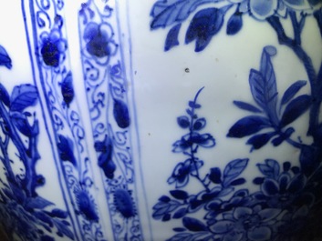 A pair of large Chinese blue and white octagonal baluster vases and covers, Kangxi