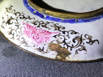 A Chinese Canton enamel quatrefoil 'Europeans' dish, Qianlong