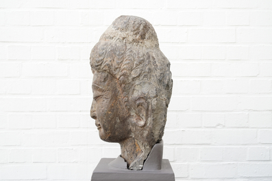 A Chinese carved limestone head of Buddha, Northern Wei (386-535)