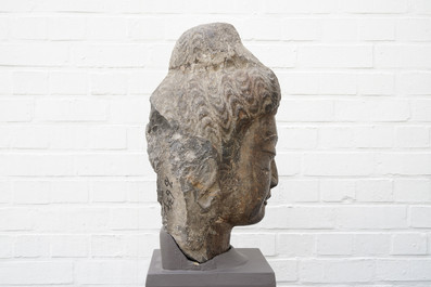 A Chinese carved limestone head of Buddha, Northern Wei (386-535)