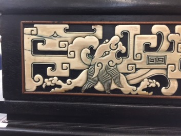 A Chinese bone and mother of pearl inlaid wood box with multiple compartments, 19th C.