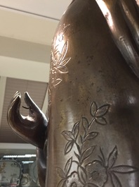 A pair of large Chinese bronze nodding-head figures for the Vietnamese market, 19th C.