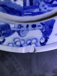A Chinese blue and white plate with figures in a pagoda, Kangxi