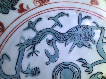 A Chinese polychrome Swatow charger with dragons and phoenixes, Ming