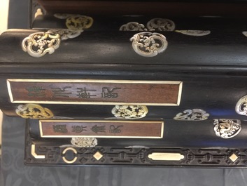 A Chinese bone and mother of pearl inlaid wood box with multiple compartments, 19th C.