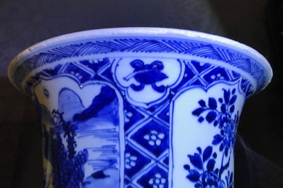 A large Chinese blue and white three-piece garniture with landscape and floral panels, Kangxi