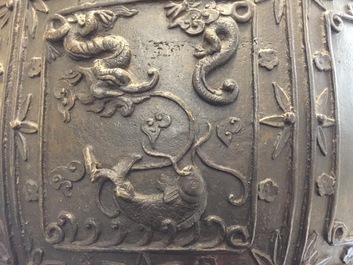 Een grote Chinese bronzen jardini&egrave;re met reli&euml;fdecor van karakters, Xuande merk, Ming