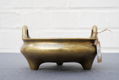 A Chinese bronze tripod censer, Xuande mark, 18th C.