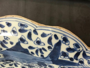 A lobed Chinese blue and white dish with fish, Kangxi