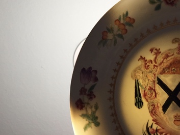 A pair of Chinese English market famille rose armorial plates, arms of Johnstone, Qianlong