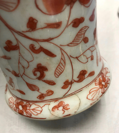 Une garniture de cinq vases en porcelaine de Chine 'lait et sang', Kangxi