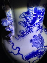 Trois vases en porcelaine de Chine bleu et blanc sur fond c&eacute;ladon, 19&egrave;me