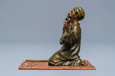 A cold-painted bronze group of a praying muslim, Vienna, signed Bergman, late 19th C.