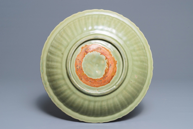 A Chinese Longquan celadon charger with incised floral design, Ming
