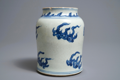 A Chinese blue and white 'clouds and flaming pearls' jar, Transitional period
