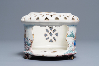 A polychrome Dutch Delft stove with a pastoral scene, late 18th C.