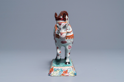 A polychrome Dutch Delft petit feu circus horse on base, 18th C.