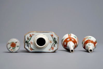 A Chinese famille verte tea caddy and cover, a moulded plate and two small vases, Kangxi