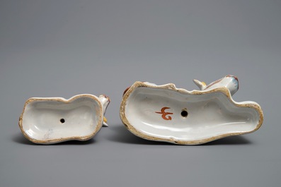 Two polychrome Dutch Delft models of recumbent cows, 18th C.