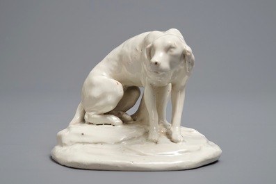 A white Dutch Delft model of a dog, 18th C.