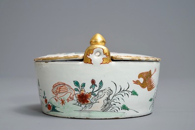 A polychrome petit feu and gilded Dutch Delft famille rose-style butter tub, 18th C.