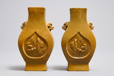 A pair of Chinese yellow glazed biscuit vases, Wang Bing Rong Zuo mark, 19th C.