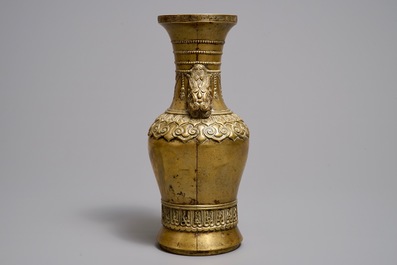 A Chinese gilt bronze vase, Xuande mark, 17/18th C.