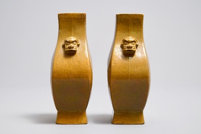 A pair of Chinese yellow glazed biscuit vases, Wang Bing Rong Zuo mark, 19th C.