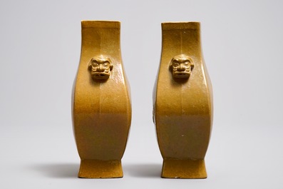 A pair of Chinese yellow glazed biscuit vases, Wang Bing Rong Zuo mark, 19th C.